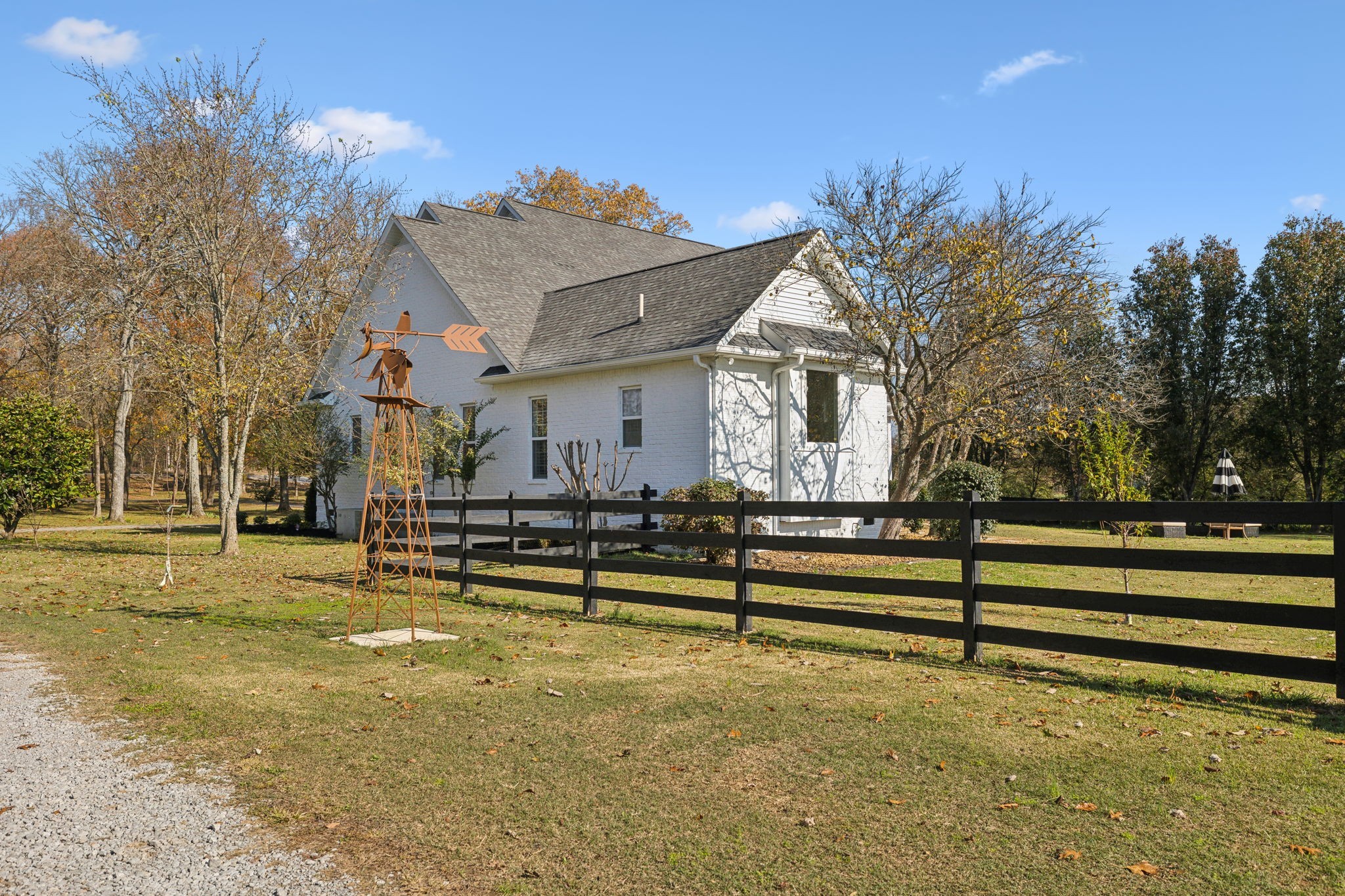 576 Rocky Valley Road Lebanon, TN 37090 - Photo 43 of 62 a view of a house with swimming pool and a yard