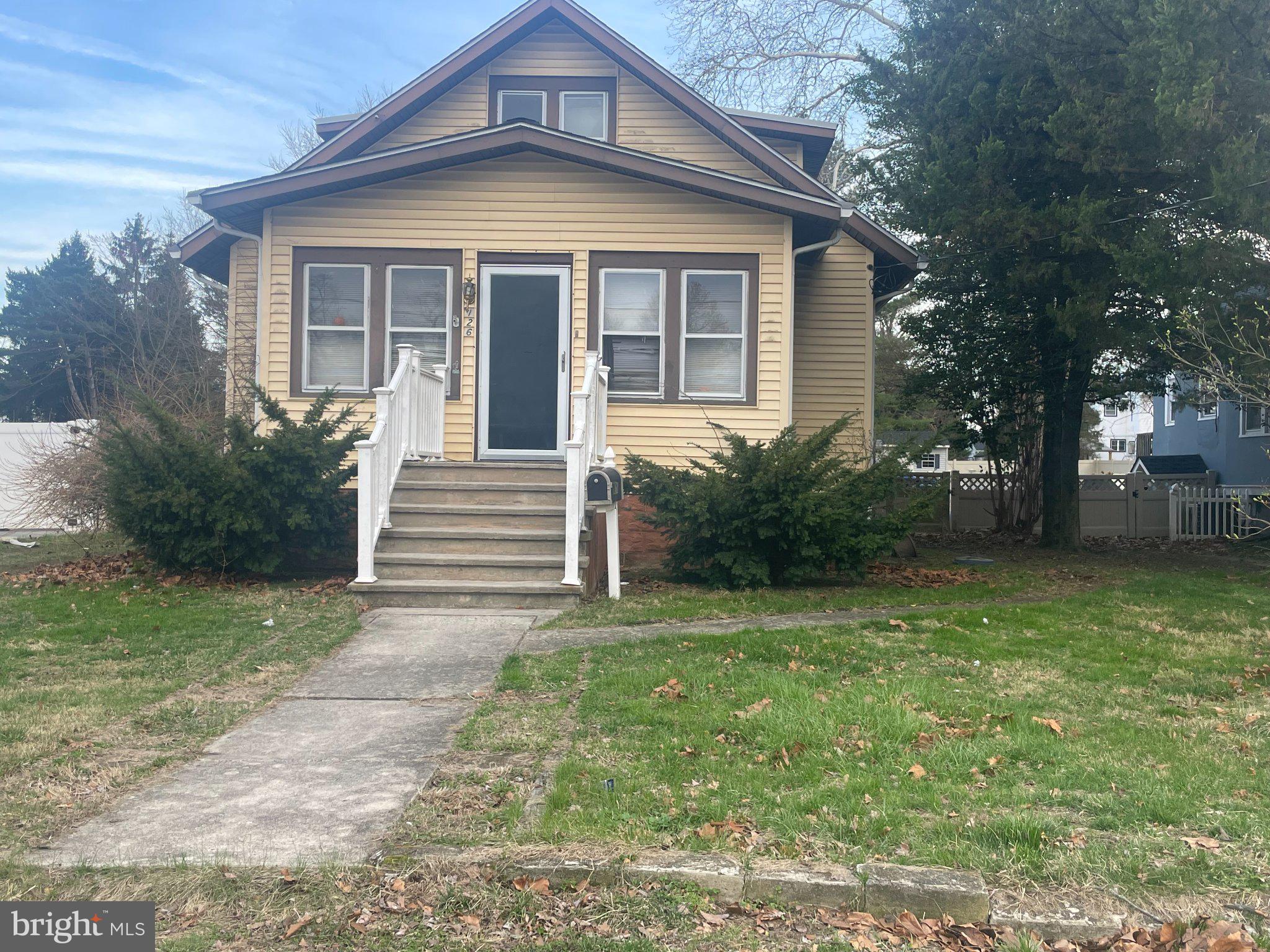 126 Thomas Avenue Maple Shade, NJ 08052 - Photo 2 of 5 Charming yellow home with inviting steps.