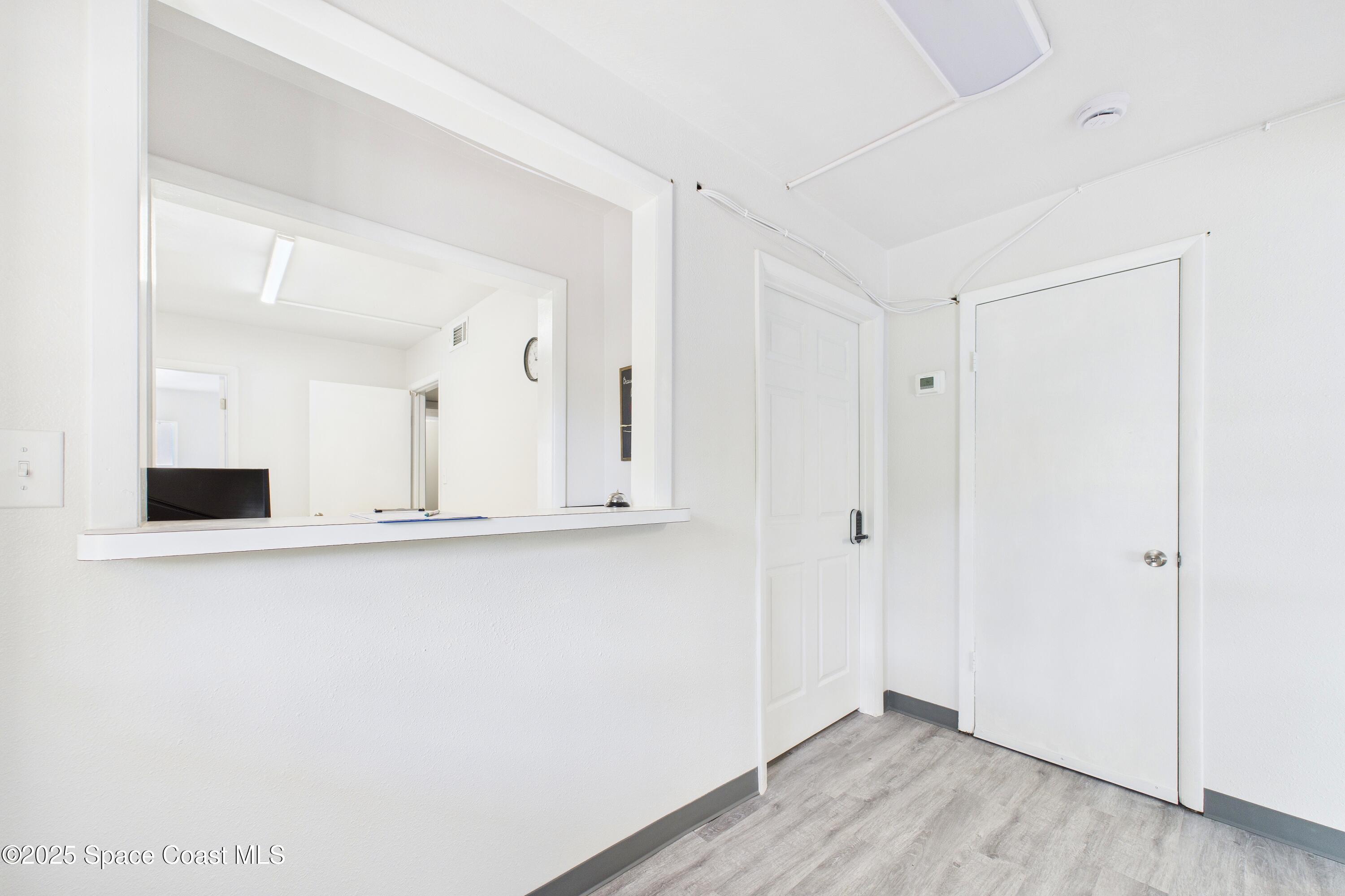 1340 South Wickham Road Melbourne, FL 32904 - Photo 2 of 50 a view of cabinets and wooden floor