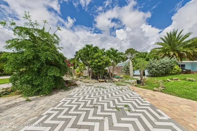 a kitchen that has a table and chairs in it