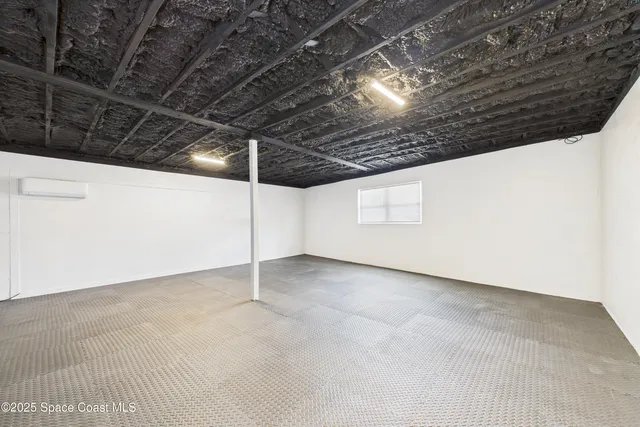 a bathroom with a double vanity sink and mirror