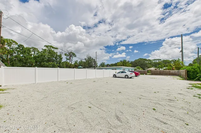 a workspace with furniture and wooden floor