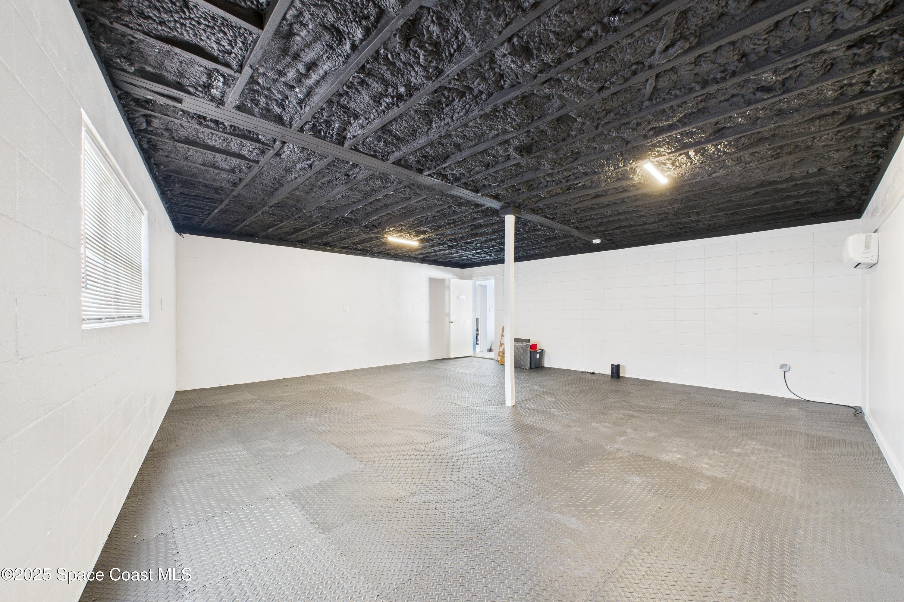 1340 South Wickham Road Melbourne, FL 32904 - Photo 7 of 50 a view of an empty room