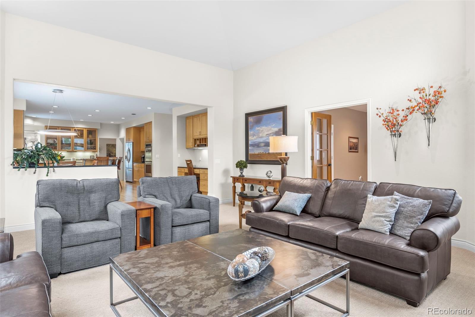 5236 Pinehurst Drive Boulder, CO 80301 - Photo 14 of 40 a living room with furniture kitchen view and a table
