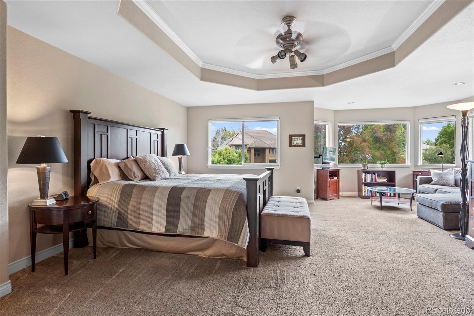 5236 Pinehurst Drive Boulder, CO 80301 - Photo 17 of 40 a spacious bedroom with a bed and a couch