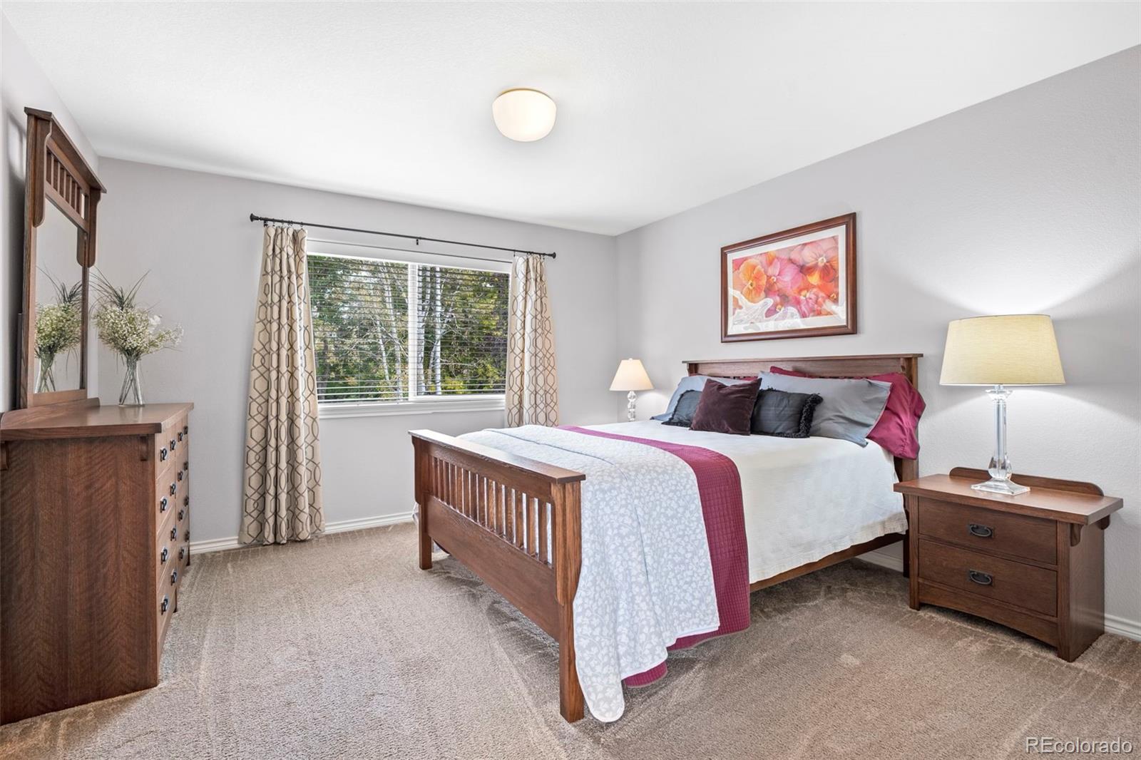 5236 Pinehurst Drive Boulder, CO 80301 - Photo 24 of 40 a bedroom with a bed and a window