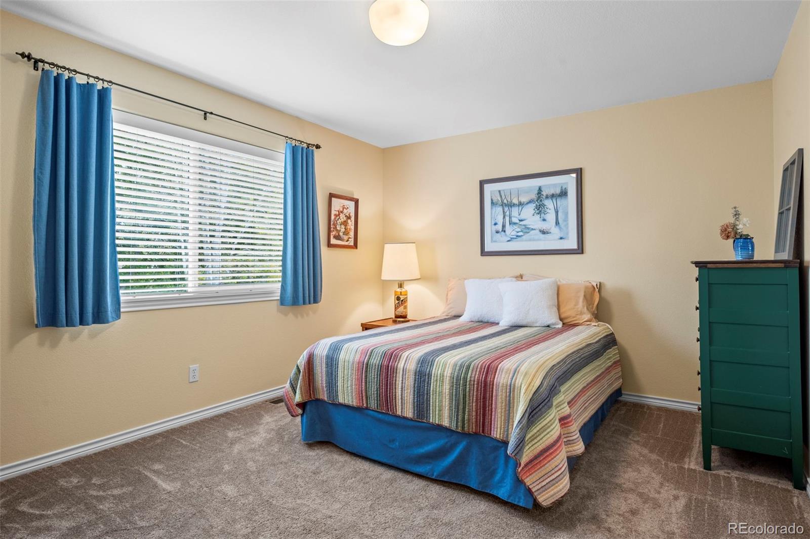 5236 Pinehurst Drive Boulder, CO 80301 - Photo 26 of 40 a bedroom with a bed and window