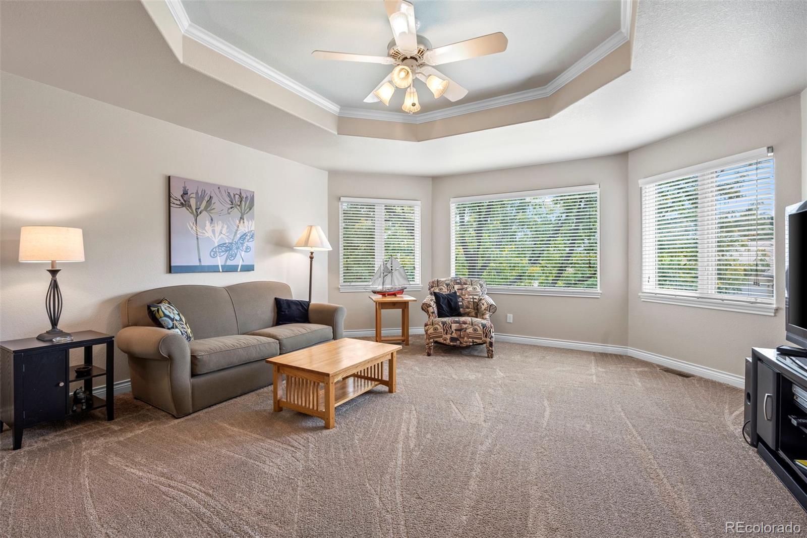 5236 Pinehurst Drive Boulder, CO 80301 - Photo 27 of 40 a living room with furniture and a large window