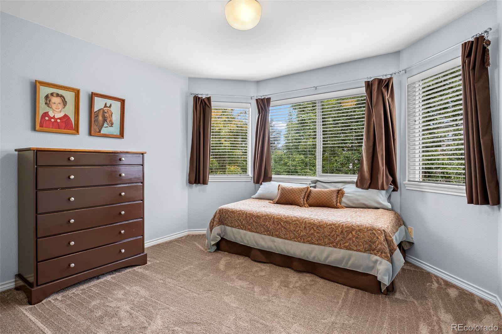 5236 Pinehurst Drive Boulder, CO 80301 - Photo 29 of 40 a bedroom with a bed and a window