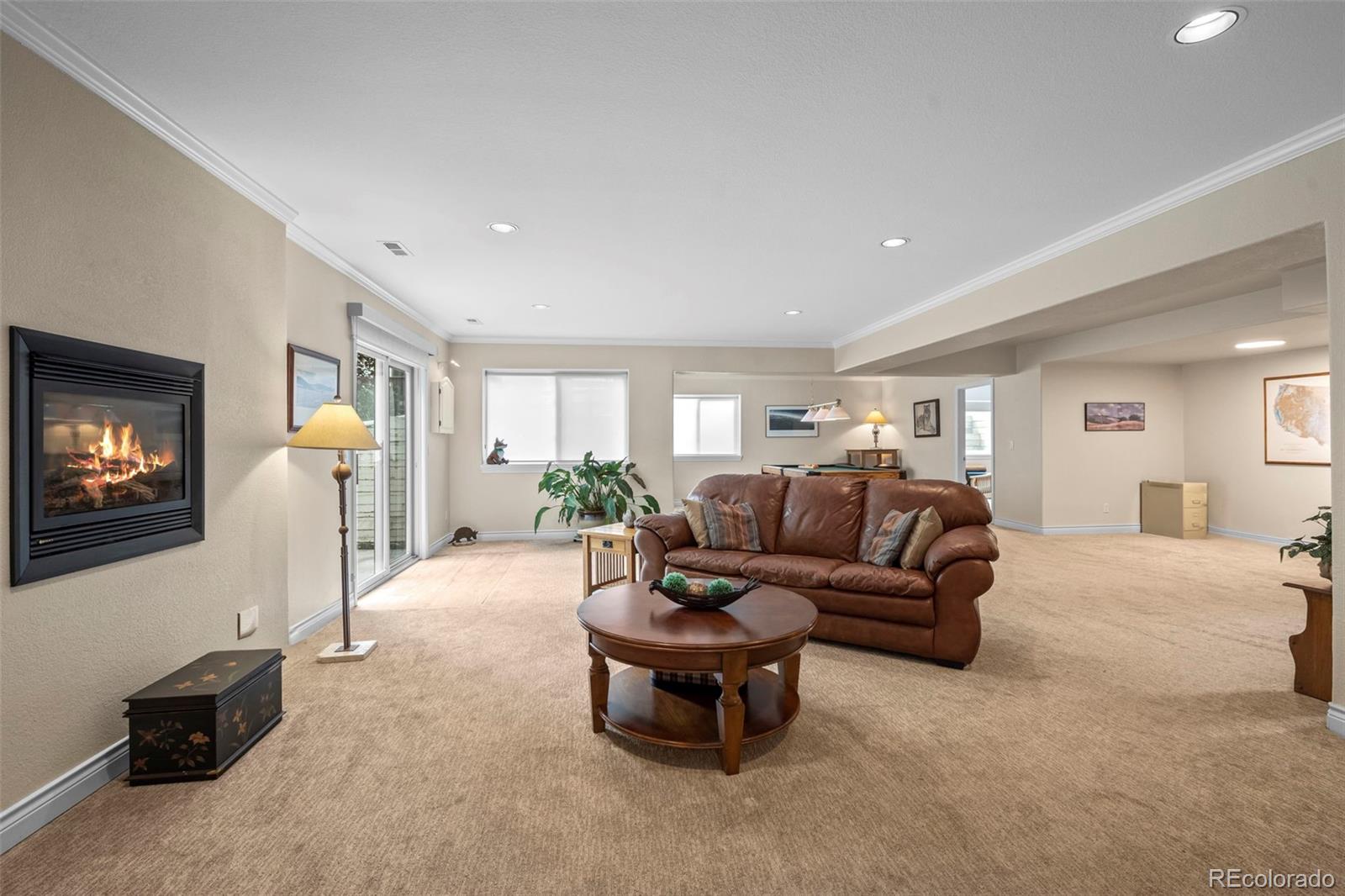 5236 Pinehurst Drive Boulder, CO 80301 - Photo 31 of 40 a living room with furniture and a flat screen tv
