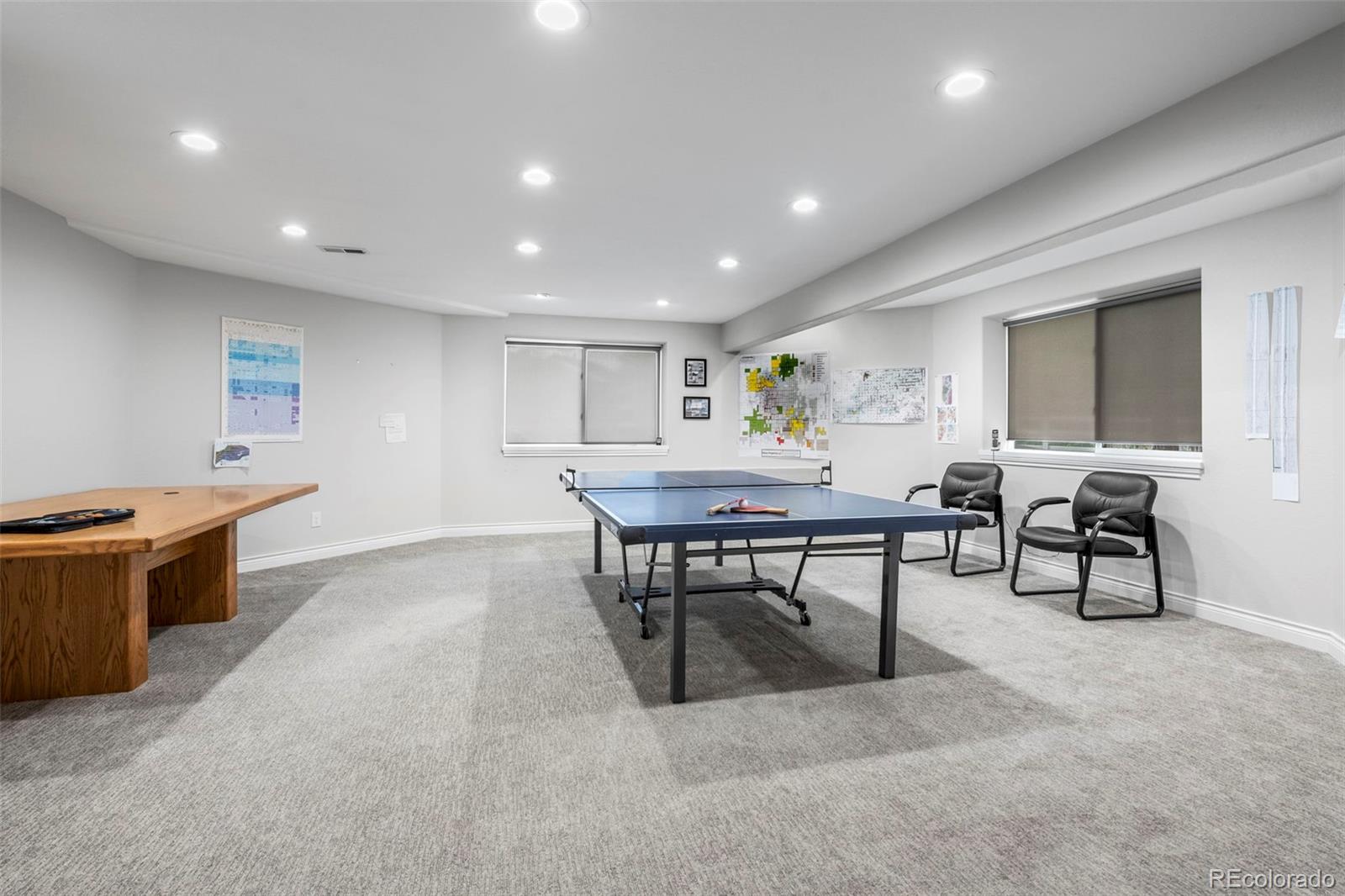 5236 Pinehurst Drive Boulder, CO 80301 - Photo 34 of 40 a living room with furniture a window and a table
