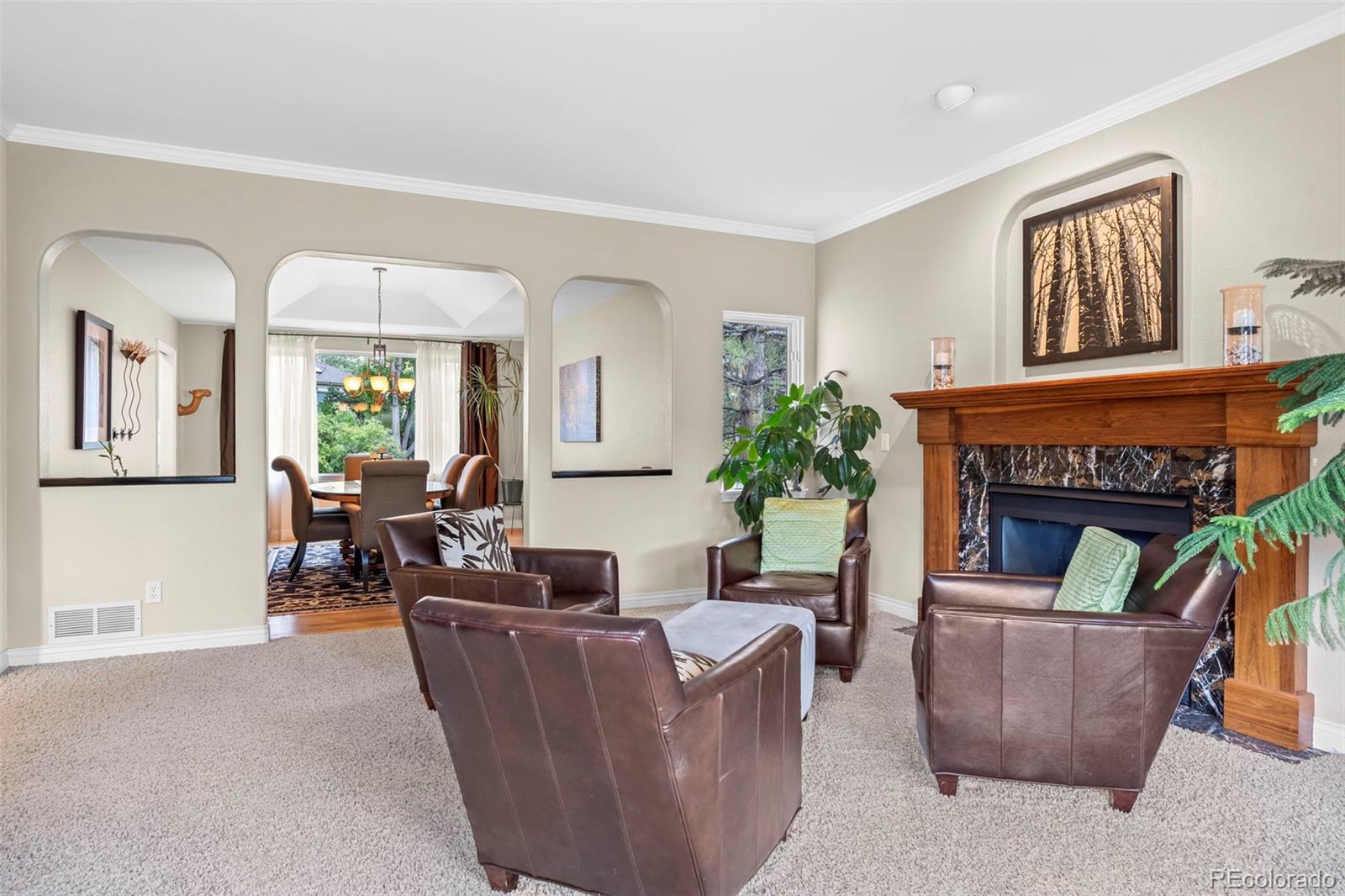 5236 Pinehurst Drive Boulder, CO 80301 - Photo 5 of 40 a living room with furniture and a fireplace