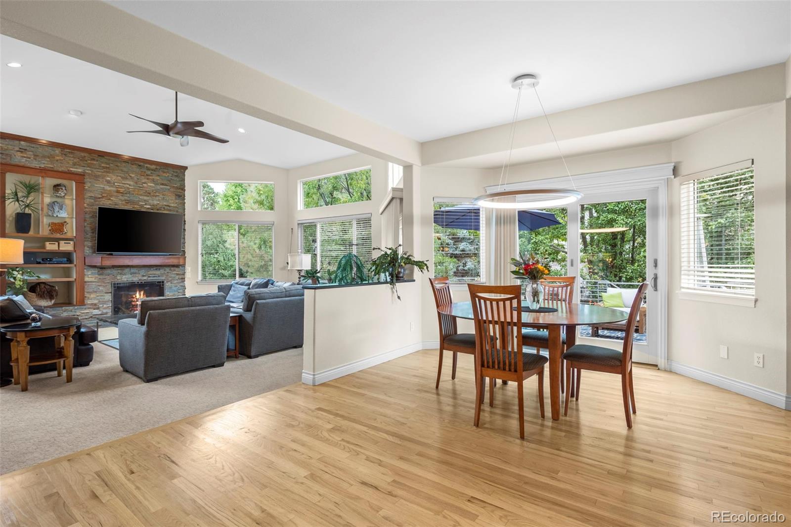 5236 Pinehurst Drive Boulder, CO 80301 - Photo 10 of 40 a dining room with furniture window wooden floor