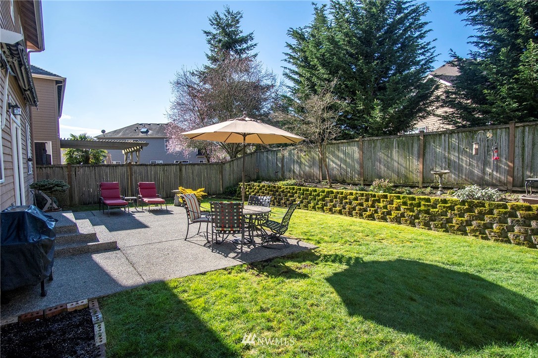 20706 37th Avenue Southeast Bothell, WA 98021 - Photo 2 of 32 a view of a backyard with a patio