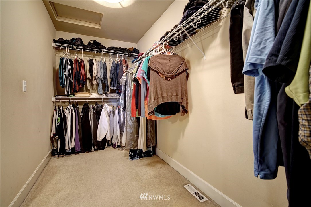 20706 37th Avenue Southeast Bothell, WA 98021 - Photo 19 of 32 a view of walk in closet with clothes