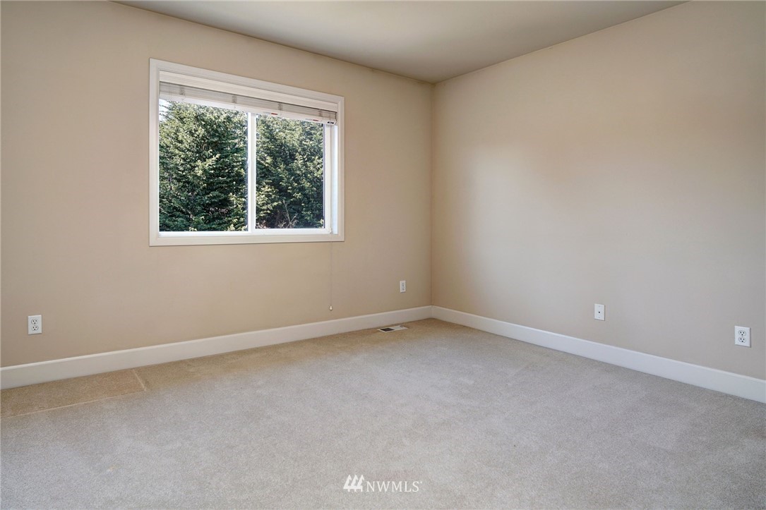 20706 37th Avenue Southeast Bothell, WA 98021 - Photo 20 of 32 an empty room with a window