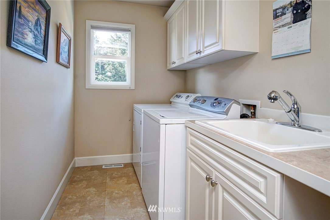 20706 37th Avenue Southeast Bothell, WA 98021 - Photo 29 of 32 a utility room with dryer and washer