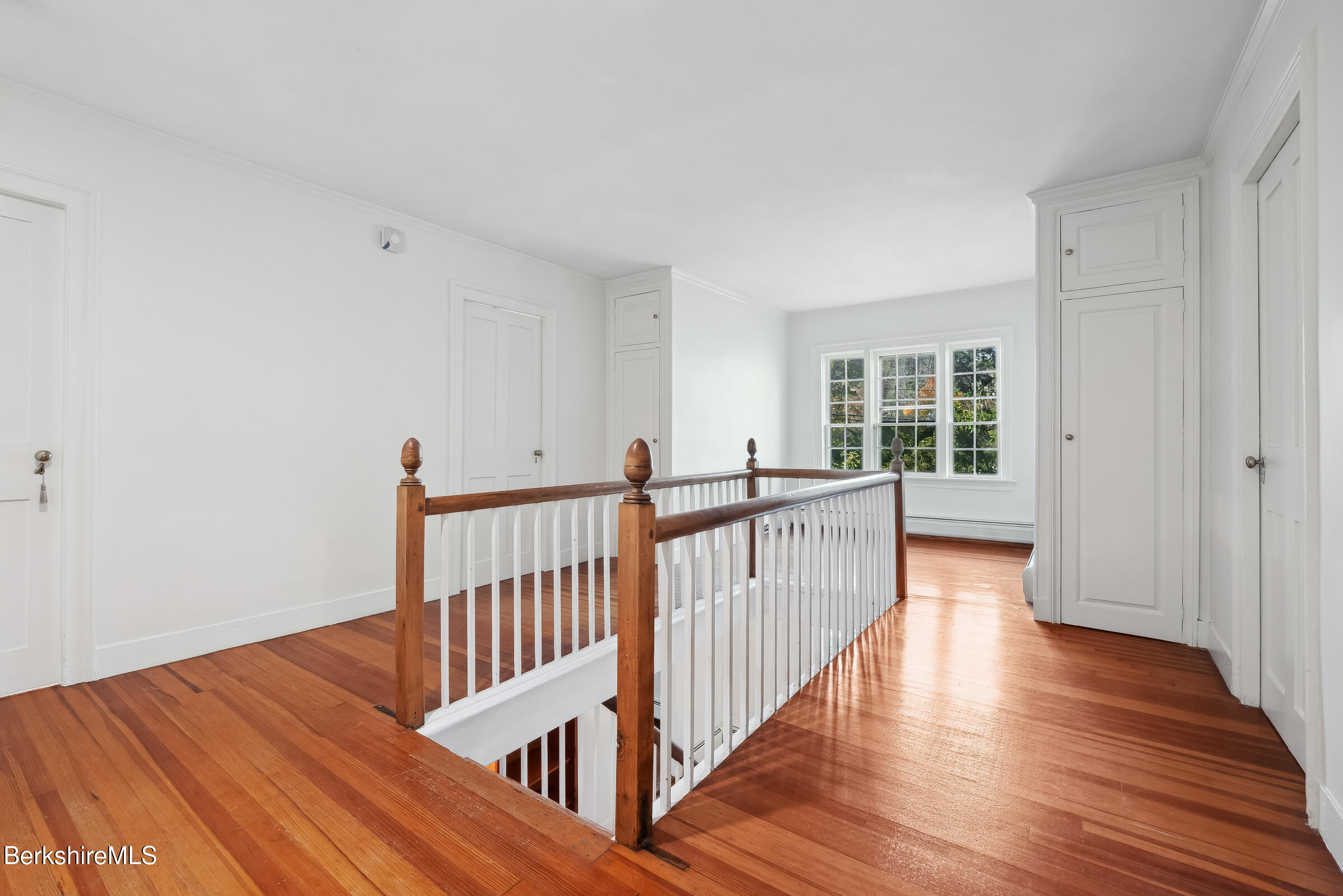82 East Main Street Stockbridge, MA 01262 - Photo 29 of 52 a view of a hallway with wooden floor and stairs