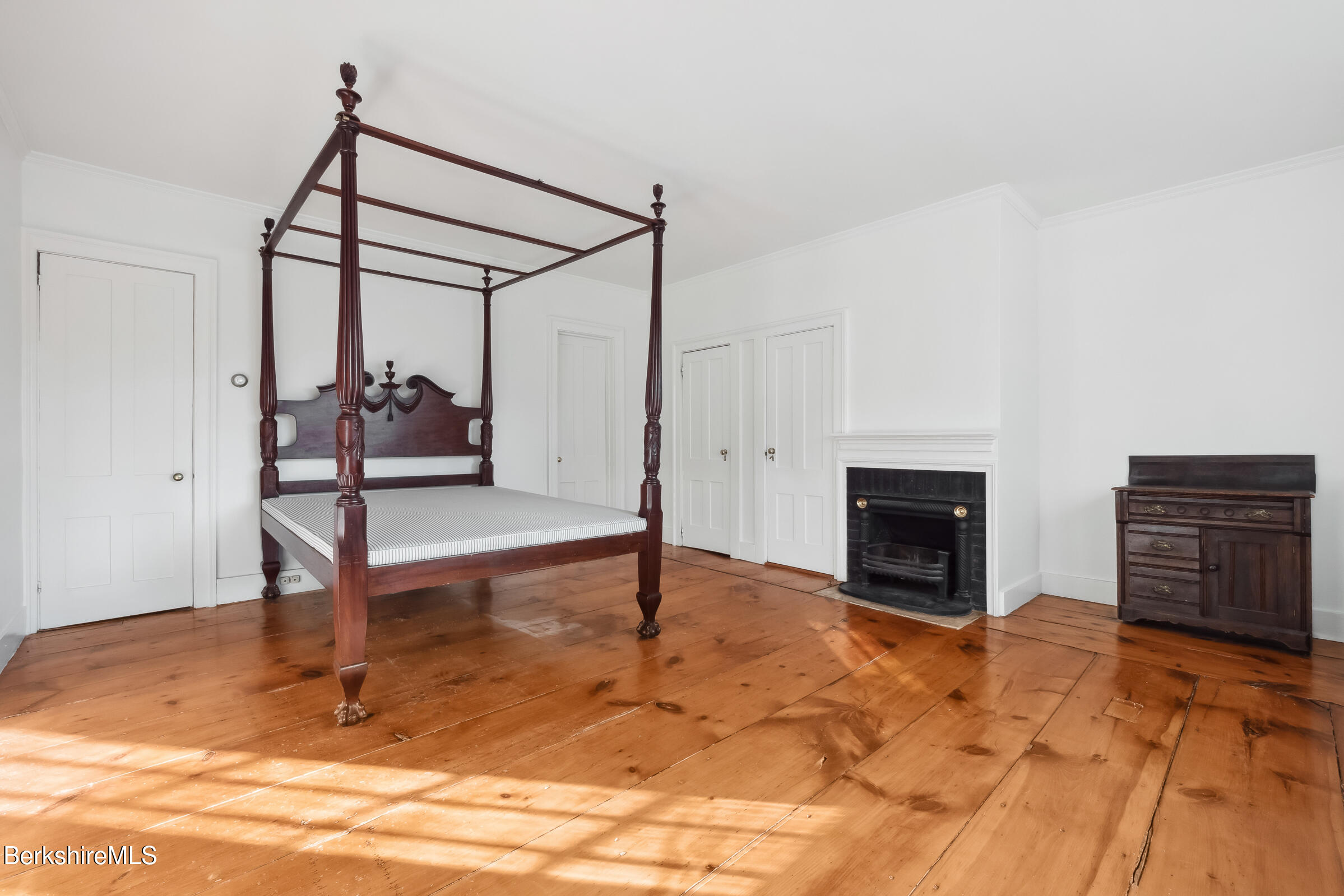 82 East Main Street Stockbridge, MA 01262 - Photo 30 of 52 a living room with furniture a flat screen tv and a fireplace