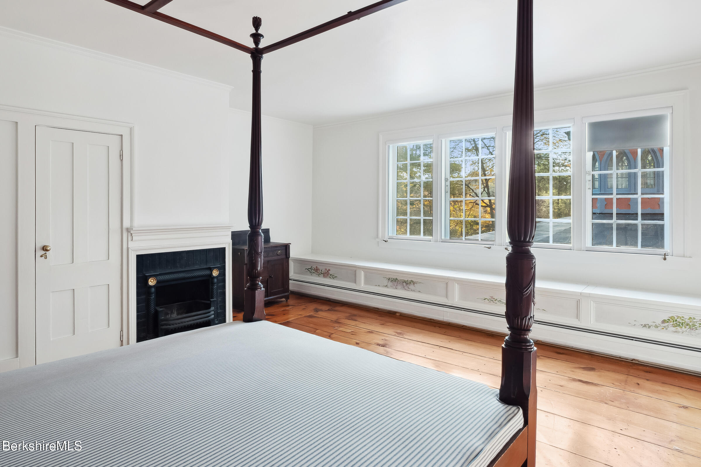 82 East Main Street Stockbridge, MA 01262 - Photo 32 of 52 a bedroom with furniture window and a fireplace