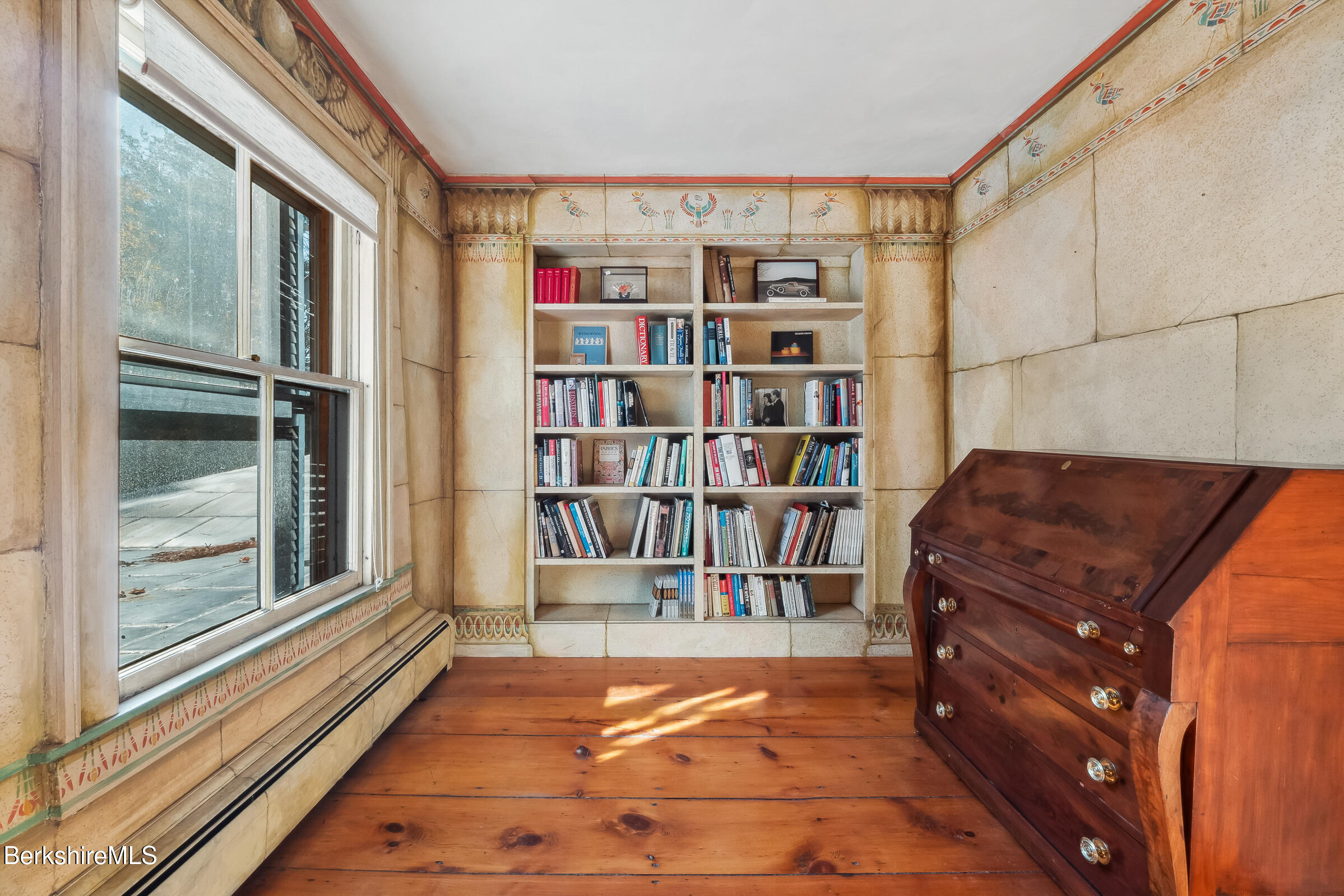 82 East Main Street Stockbridge, MA 01262 - Photo 36 of 52 a living room with a bookshelf and a book shelf