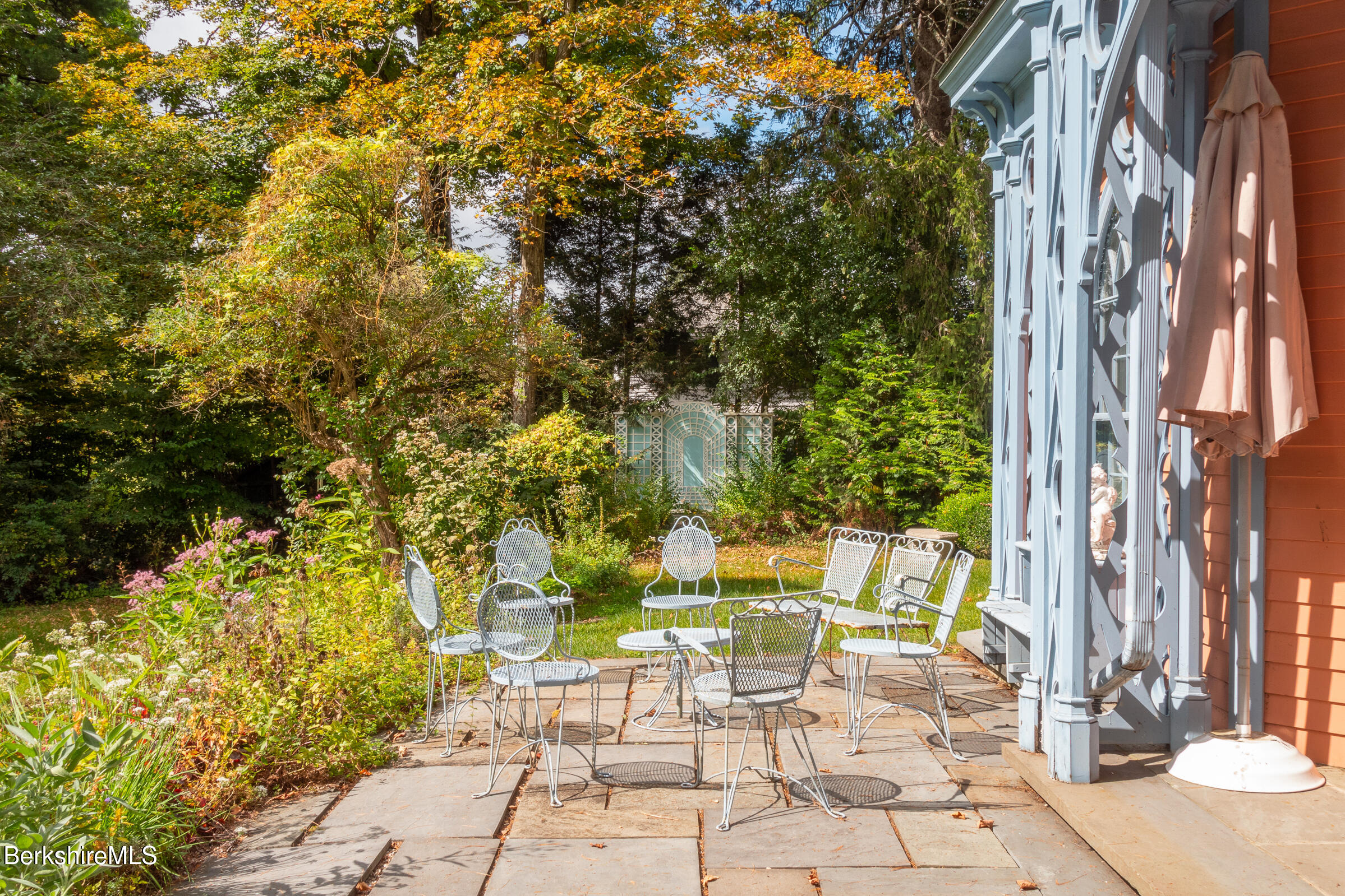 82 East Main Street Stockbridge, MA 01262 - Photo 49 of 52 a view of a patio with table and chairs and potted plants