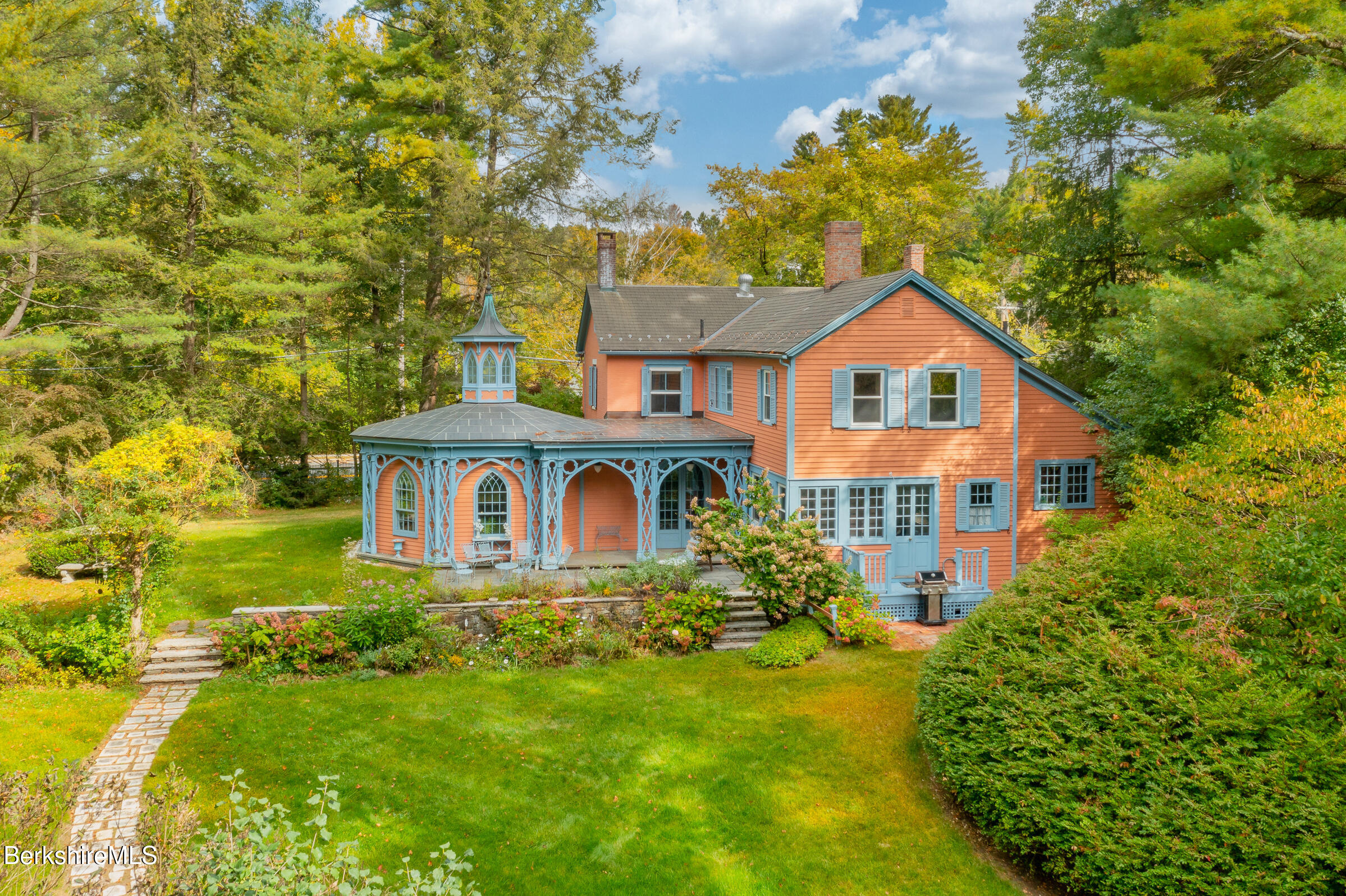 82 East Main Street Stockbridge, MA 01262 - Photo 52 of 52 a front view of a house with garden