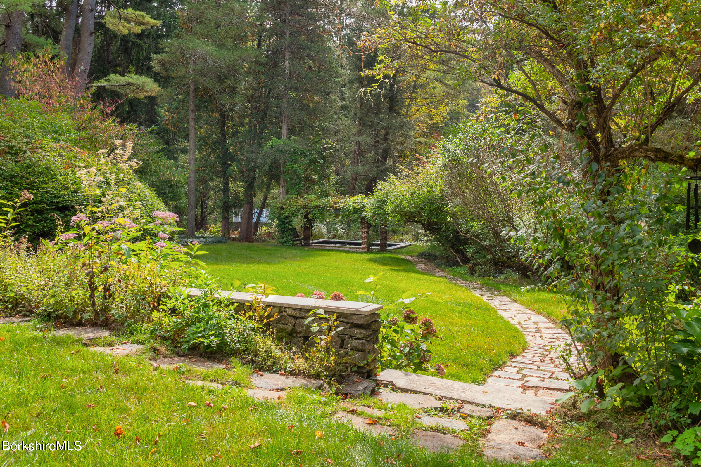 82 East Main Street Stockbridge, MA 01262 - Photo 7 of 52 a view of a swimming pool with a yard