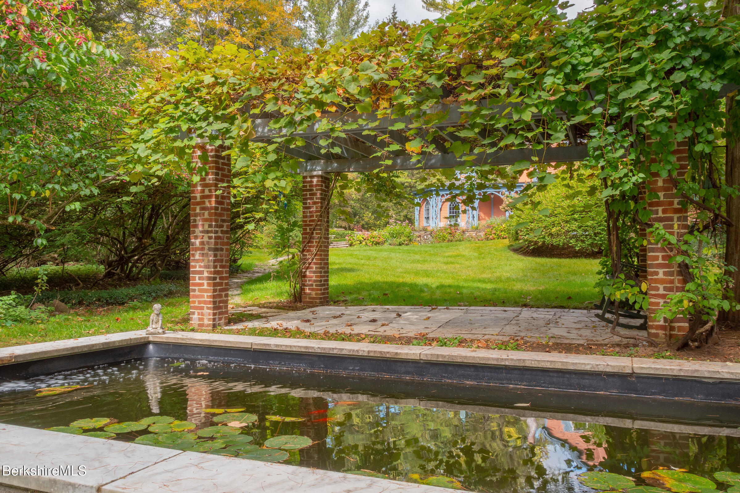 82 East Main Street Stockbridge, MA 01262 - Photo 8 of 52 a front view of a house with a yard