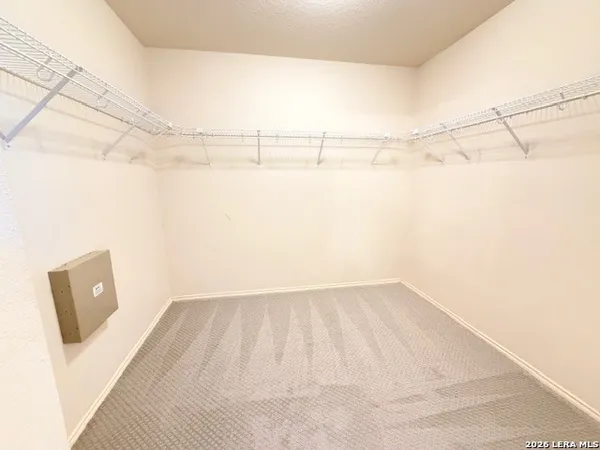 a view of a room with racks on the wall