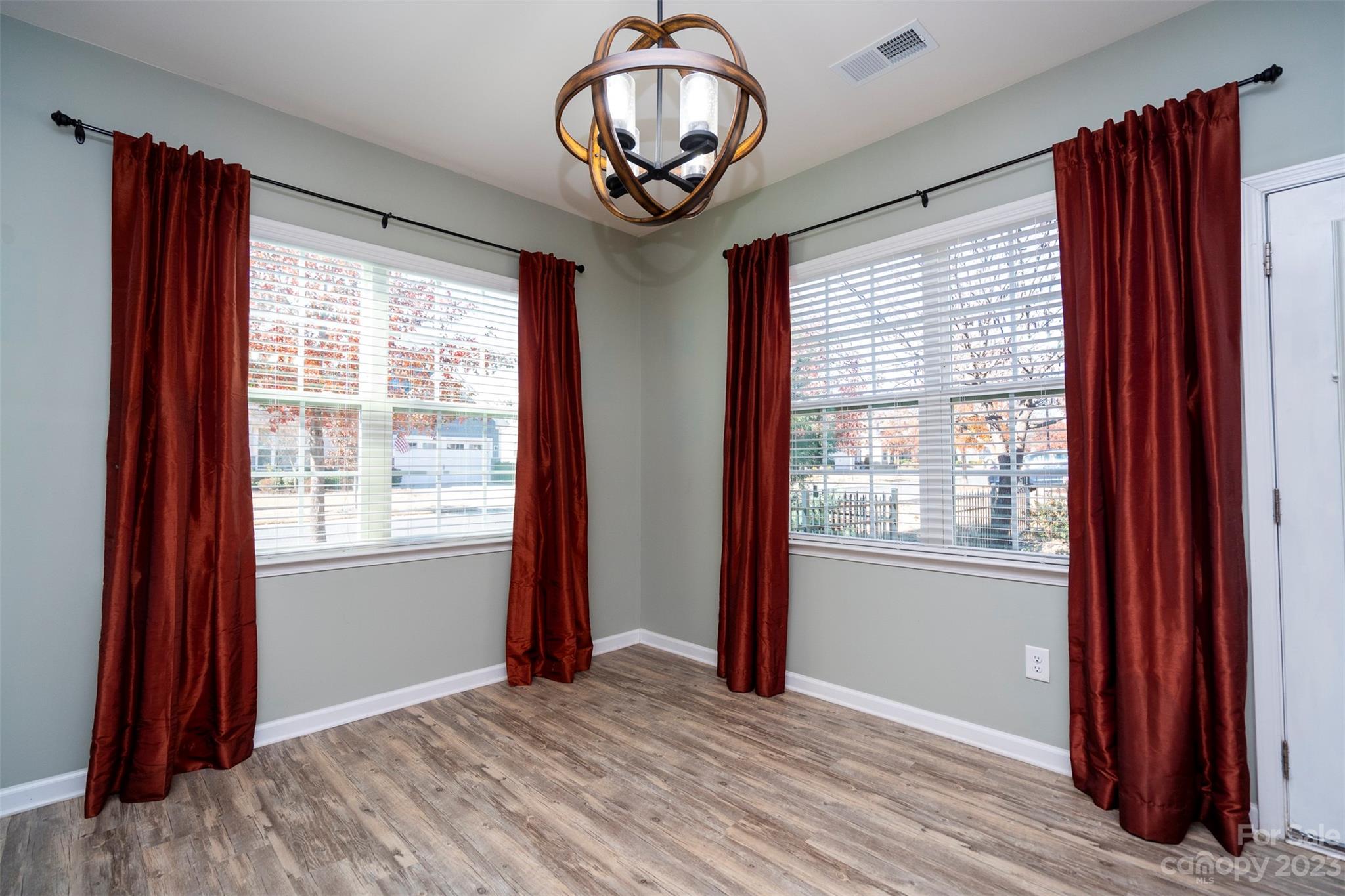 8202 Asher Chase Trail Lancaster, SC 29720 - Photo 17 of 42 wooden floor in an empty room with a window