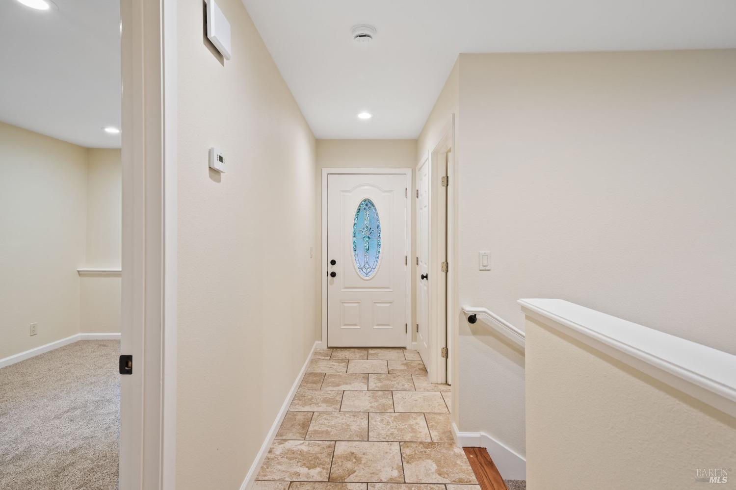 84 Front Street Camp Meeker, CA 95419 - Photo 12 of 24 a view of a hallway with wooden floor and staircase