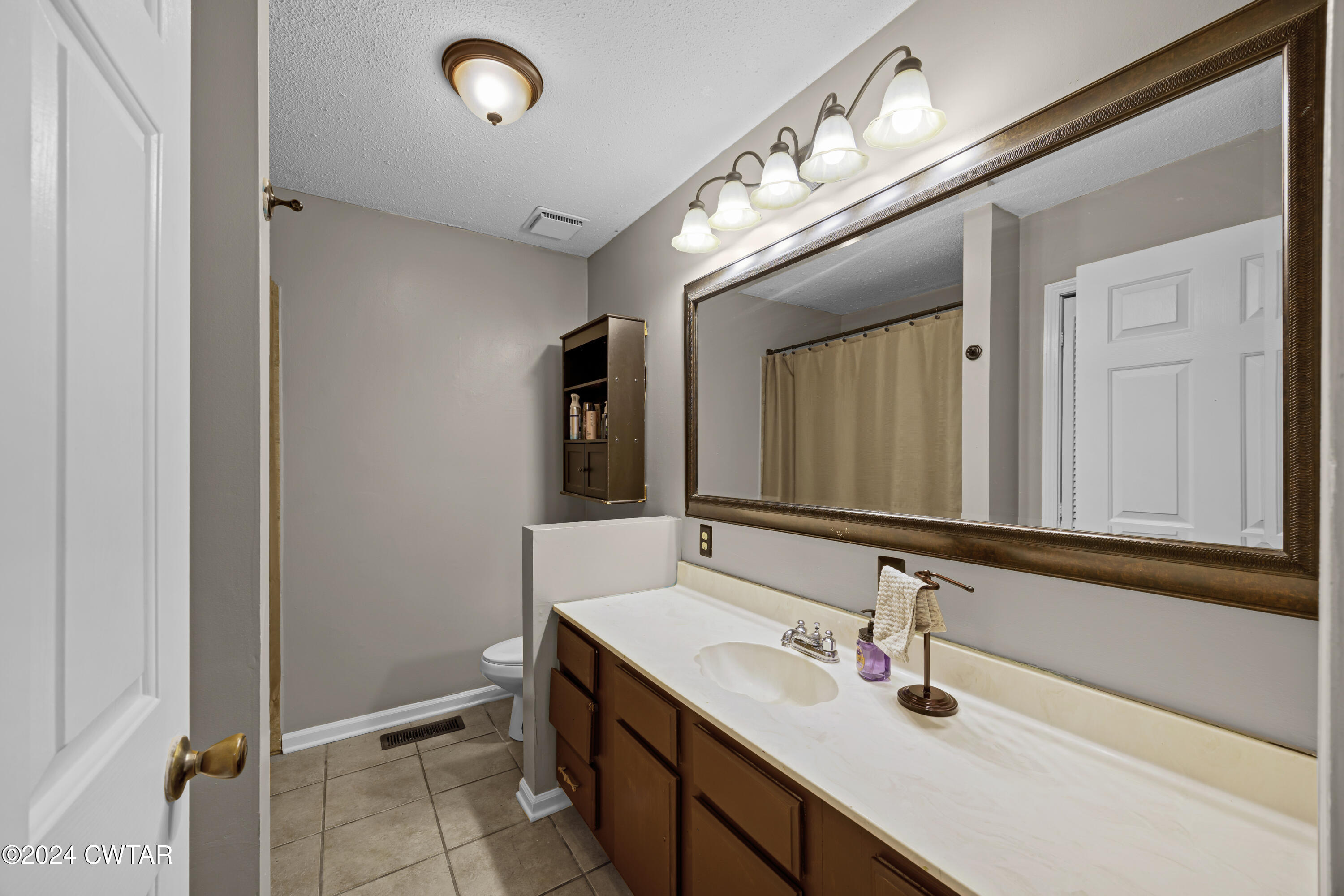 903 Rocky Springs Road Beech Bluff, TN 38313 - Photo 15 of 28 Hall Bathroom