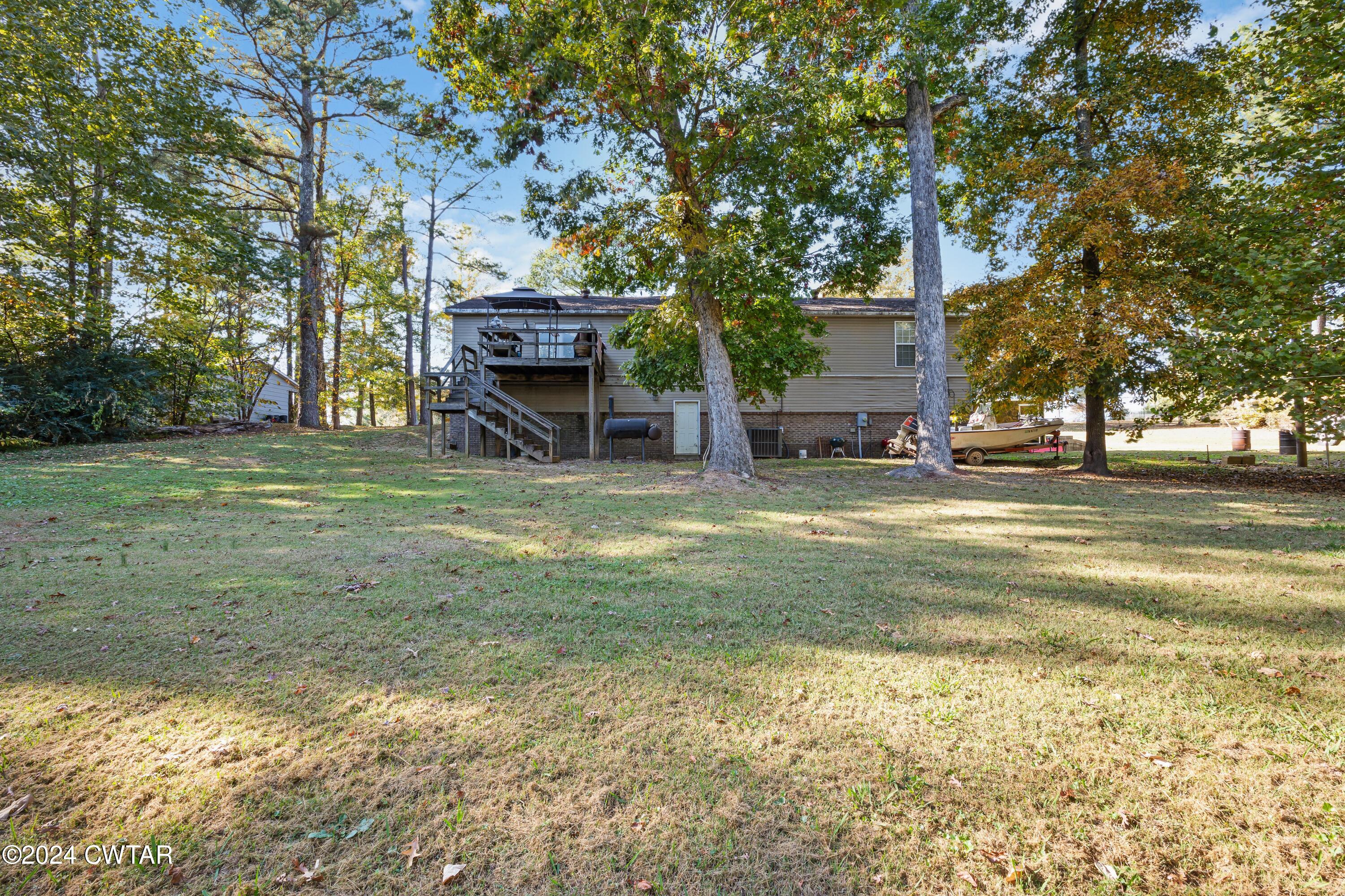 903 Rocky Springs Road Beech Bluff, TN 38313 - Photo 23 of 28 Back View