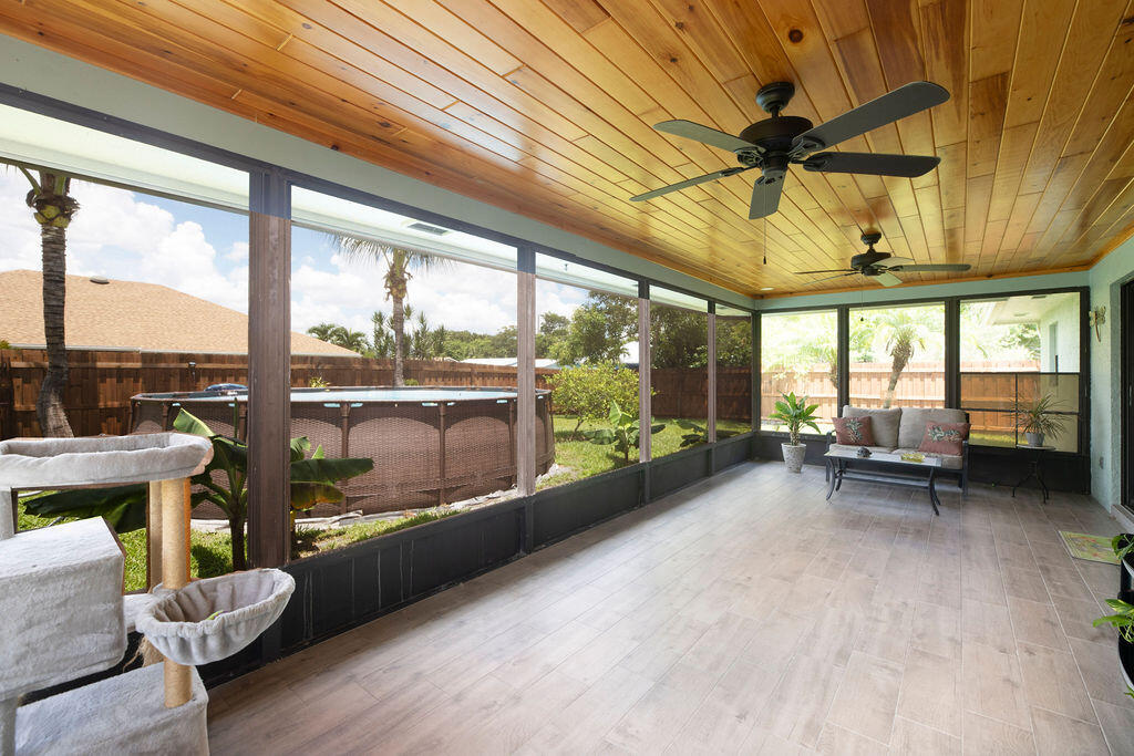 2402 Southeast Pinero Road Port St. Lucie, FL 34952 - Photo 23 of 45 a view of a living room and a balcony