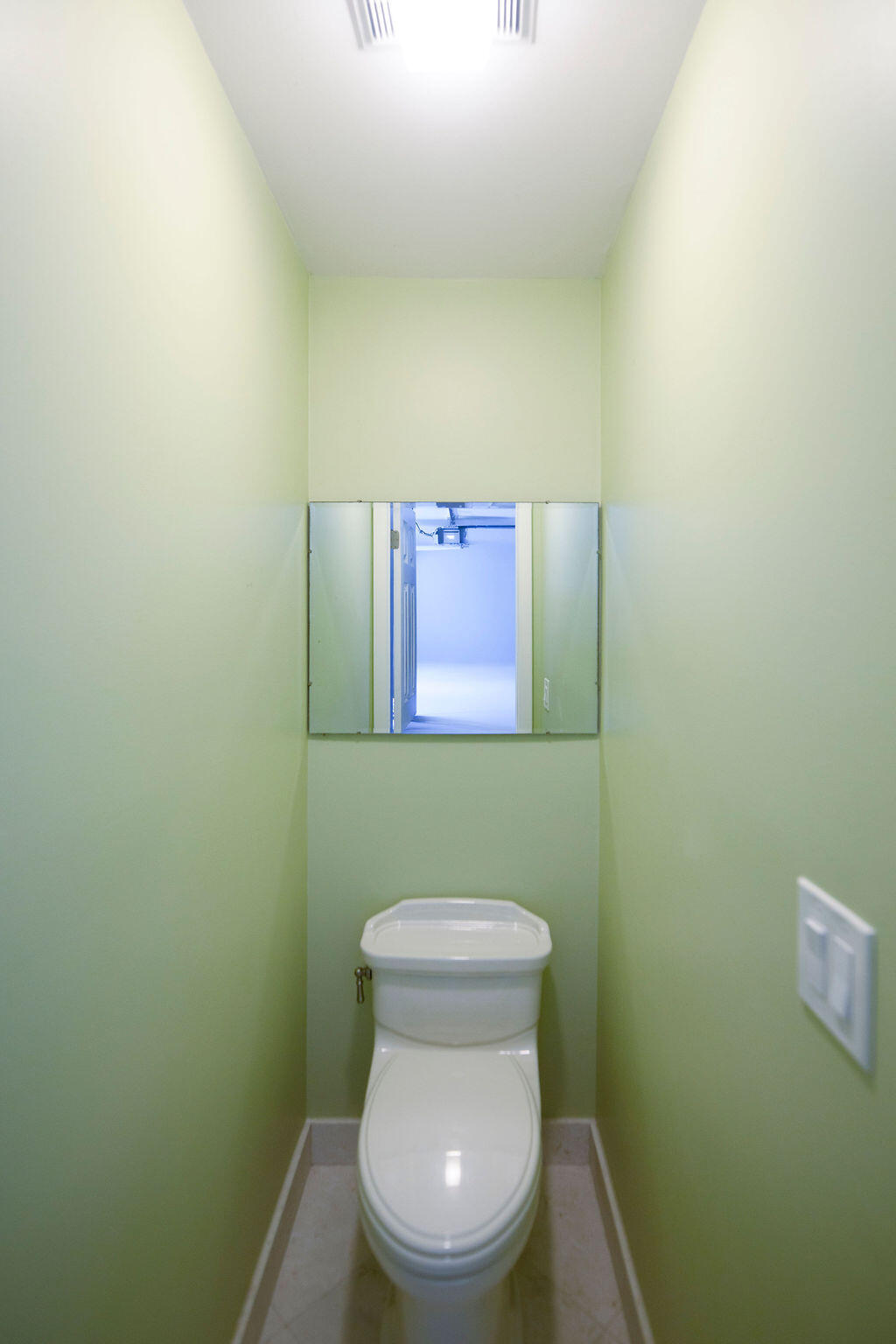 2402 Southeast Pinero Road Port St. Lucie, FL 34952 - Photo 24 of 45 a bathroom with a toilet