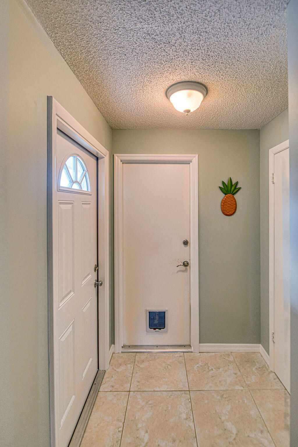 2402 Southeast Pinero Road Port St. Lucie, FL 34952 - Photo 26 of 45 a view of an empty room