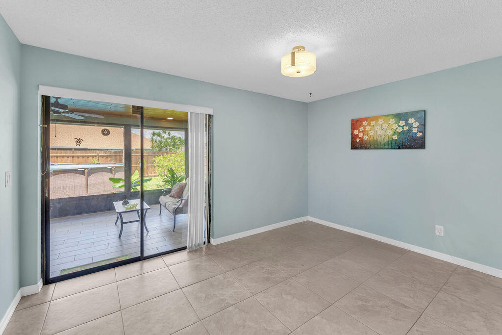 2402 Southeast Pinero Road Port St. Lucie, FL 34952 - Photo 32 of 45 a view of an empty room and window
