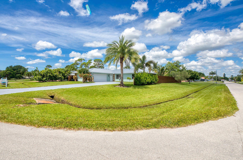 2402 Southeast Pinero Road Port St. Lucie, FL 34952 - Photo 4 of 45 a view of a playground with basketball court