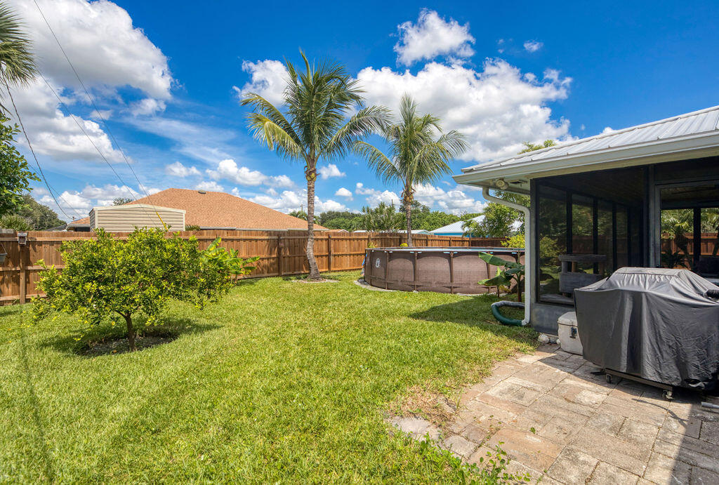 2402 Southeast Pinero Road Port St. Lucie, FL 34952 - Photo 7 of 45 a view of a backyard