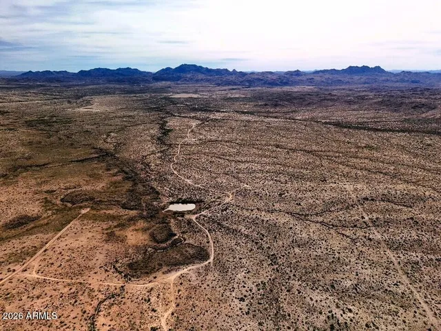 a view of lake and mountain