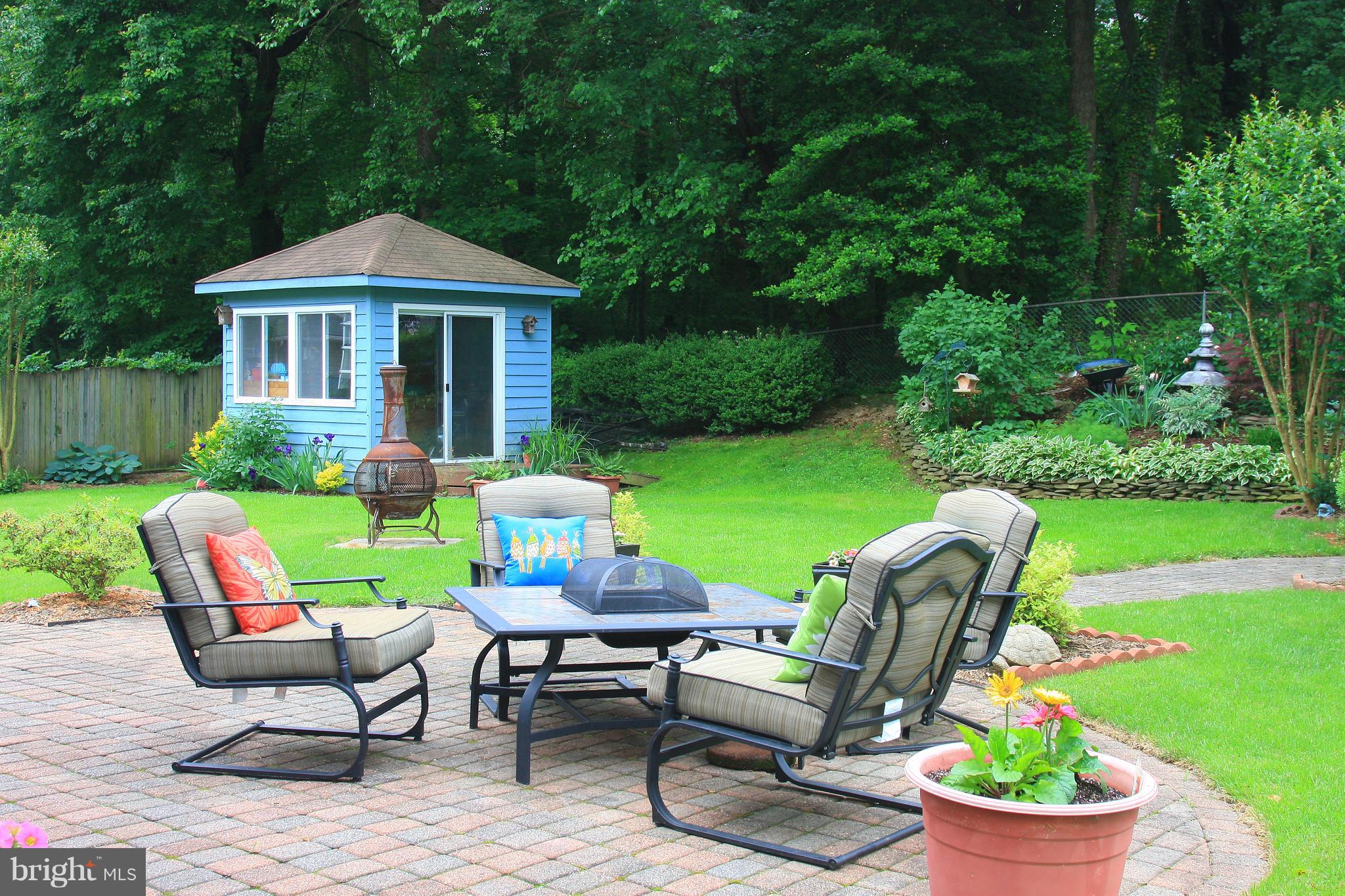 13 Roe Lane Arnold, MD 21012 - Photo 20 of 31 Paved firepit patio