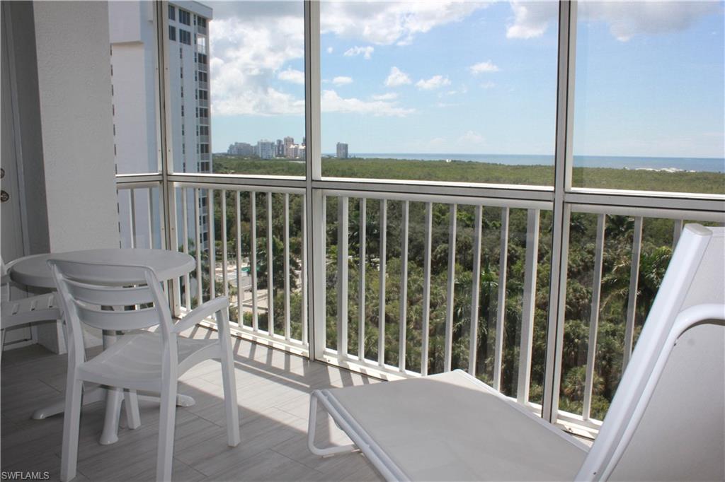 6573 Marissa Loop, Unit 902 Naples, FL 34108 - Photo 1 of 26 a view of a balcony with chairs