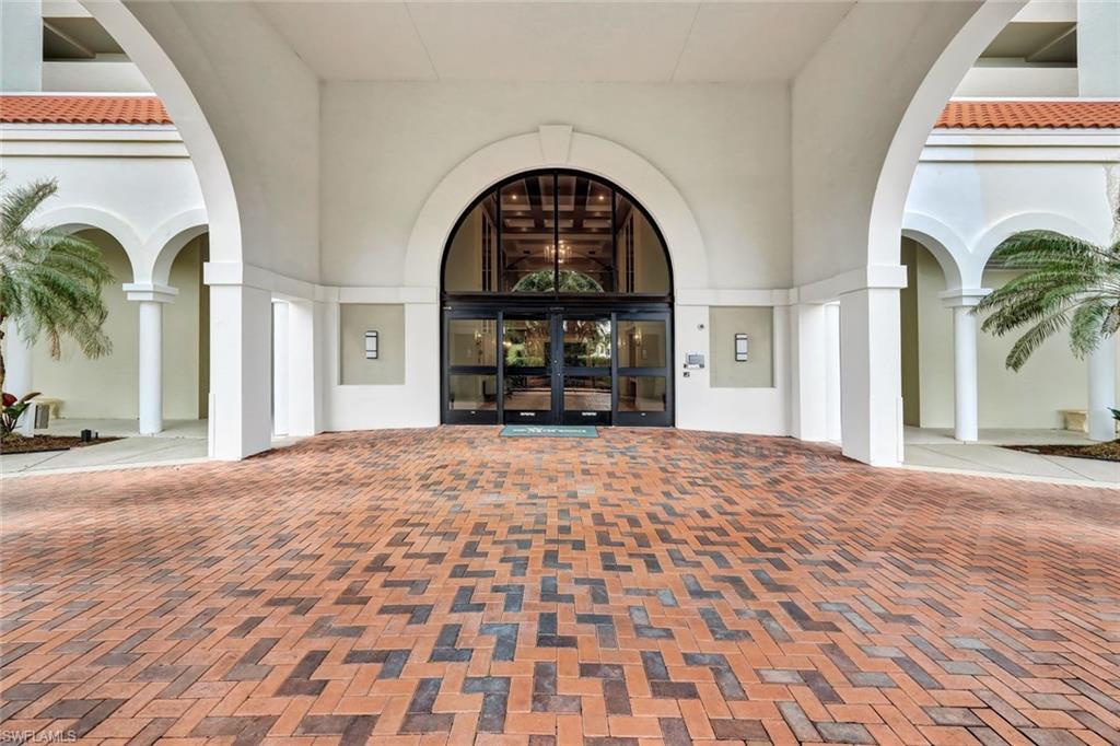 6573 Marissa Loop, Unit 902 Naples, FL 34108 - Photo 26 of 26 a view of living room with a fireplace