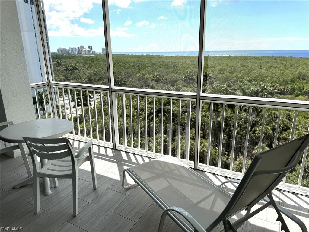 6573 Marissa Loop, Unit 902 Naples, FL 34108 - Photo 3 of 26 a view of a balcony with chair