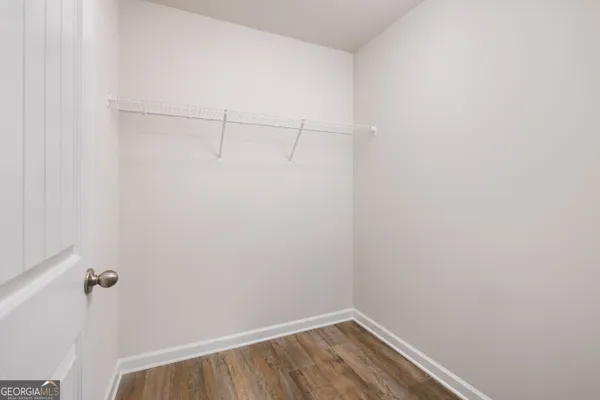 a view of a room with racks on the wall