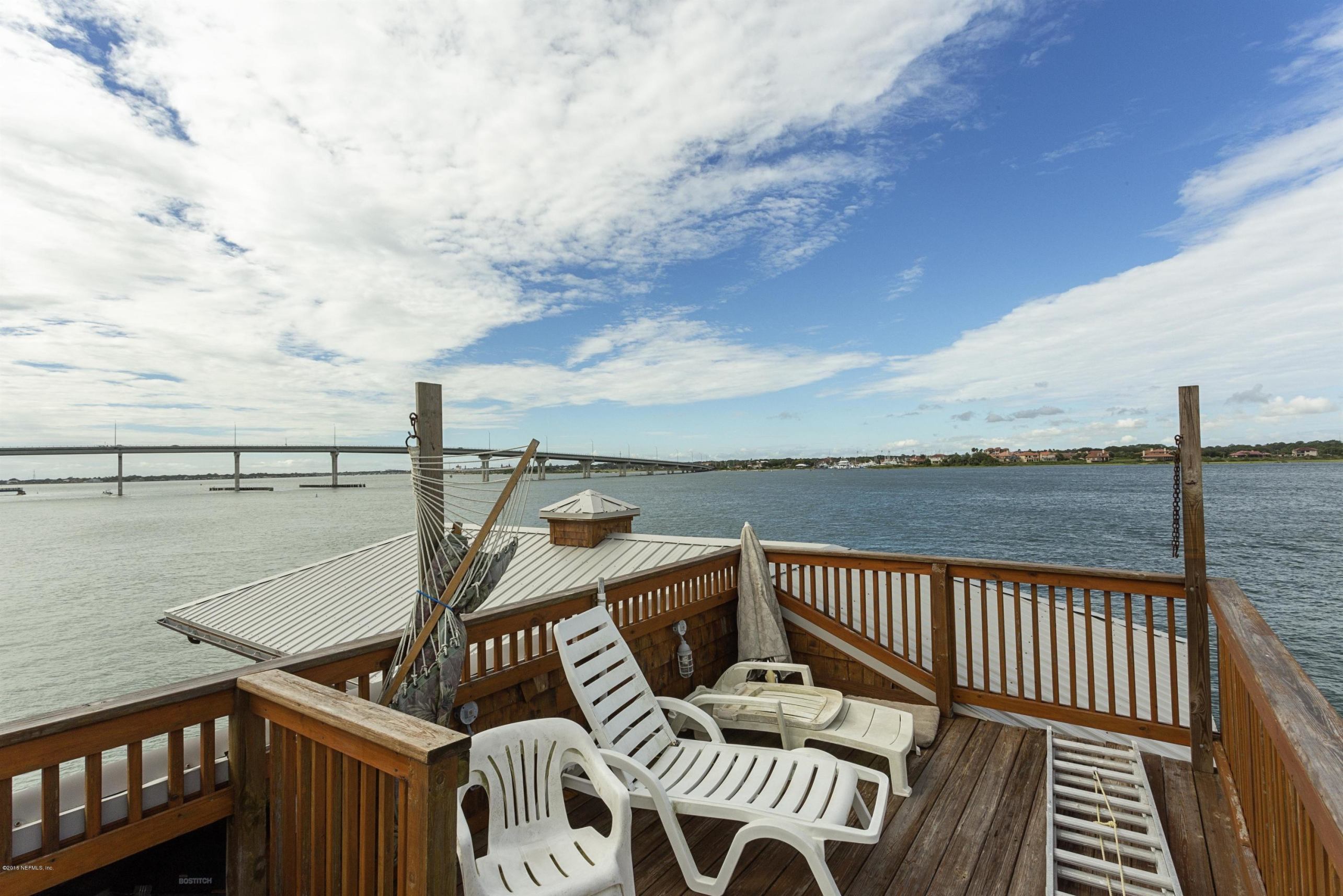 249 Rivershore Lane St. Augustine, FL 32084 - Photo 16 of 22 a view of a roof deck with couches and wooden floor