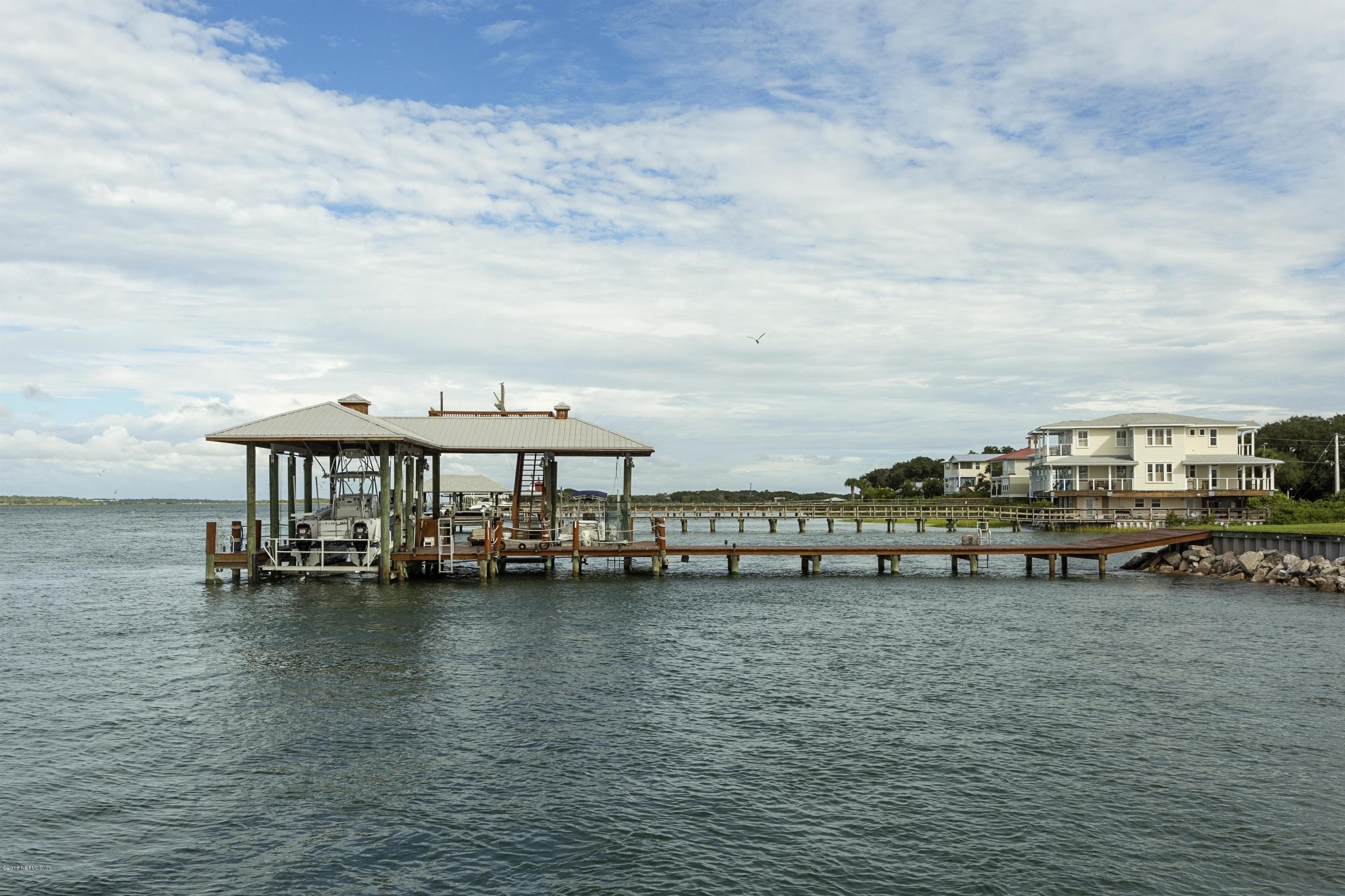 249 Rivershore Lane St. Augustine, FL 32084 - Photo 8 of 22 a view of a water with boats and trees