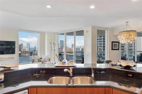 a large bathroom with a tub sink shower and mirror