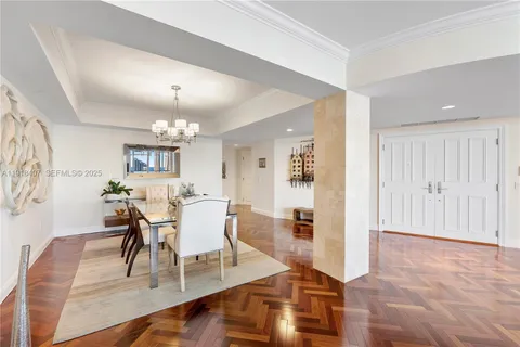 a bathroom with a sink vanity mirror and toilet